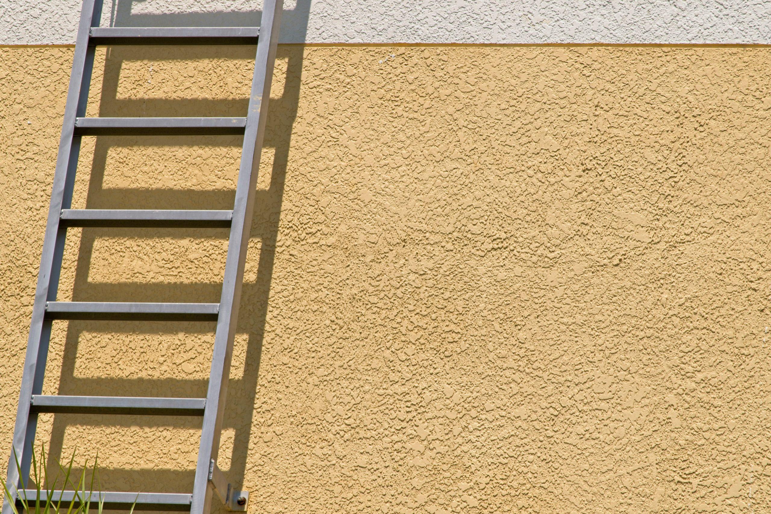 minimalist view of a yellow stucco wall with a met 2022 10 31 09 26 00 utc scaled