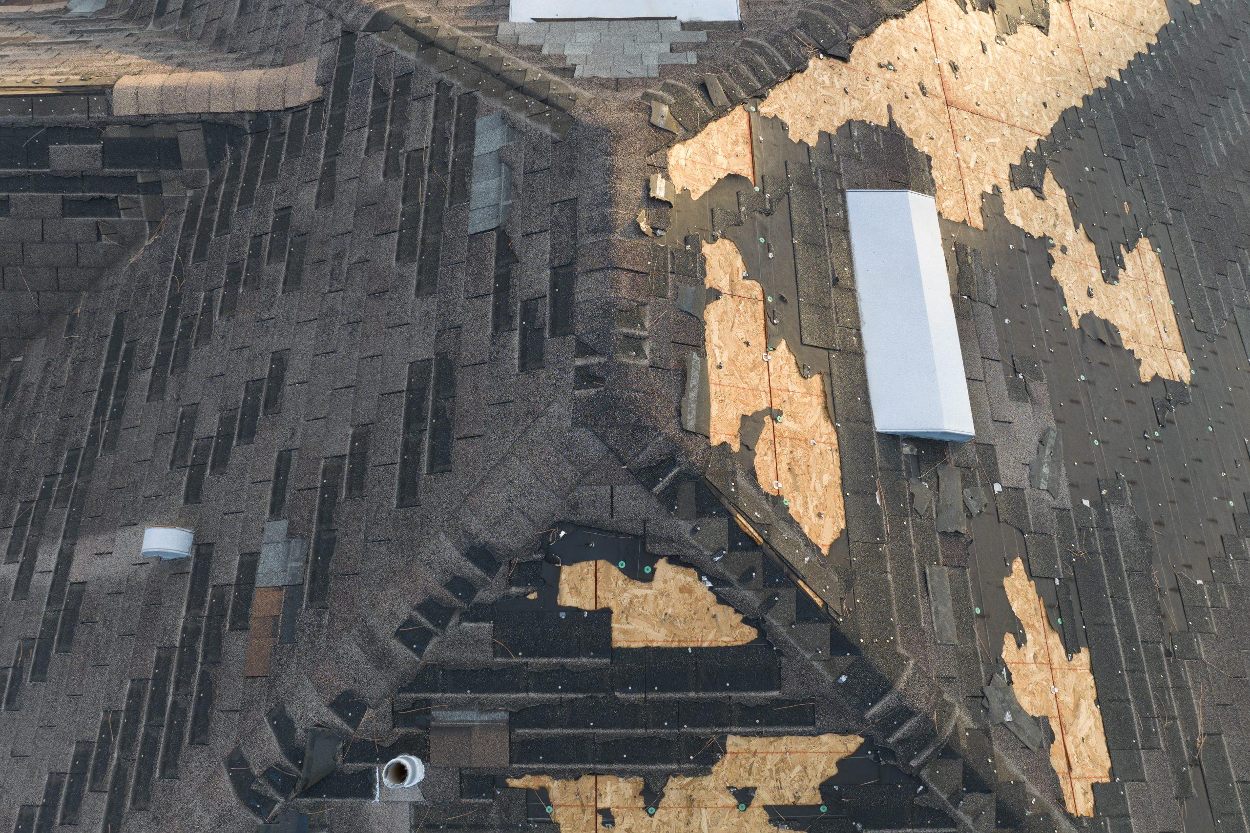 wind damaged house roof with missing asphalt shing 2024 04 11 17 47 02 utc scaled