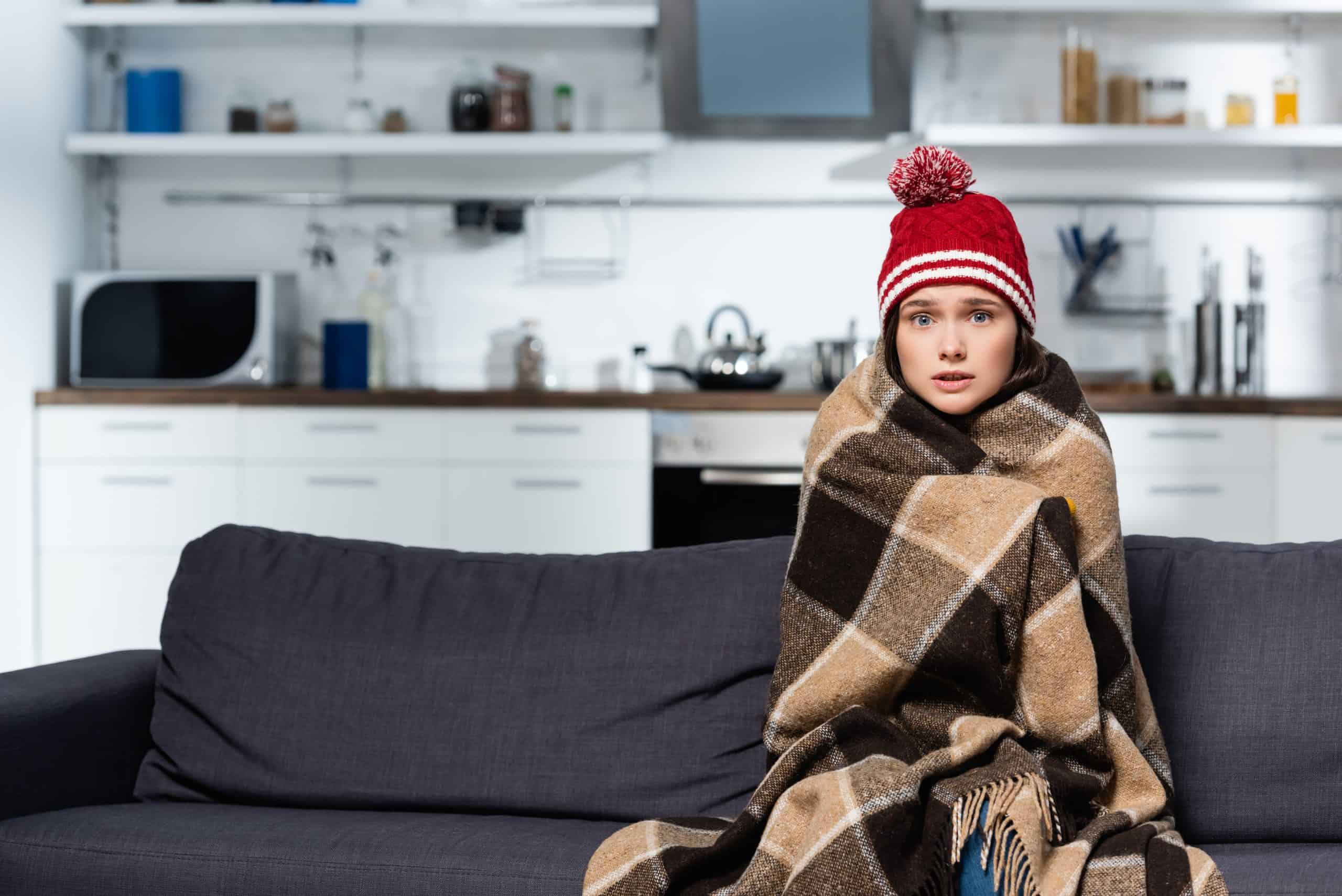 freezing woman in knitted hat covering with warm 2024 11 19 08 38 25 utc scaled